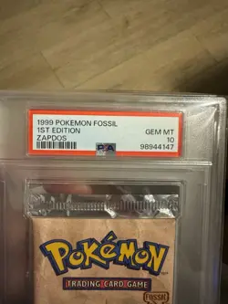1999 Pokemon Fossil 1st Edition Zapdos Booster Pack PSA 10 English Cert 98944147 - Image 2