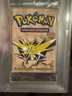 1999 Pokemon Fossil 1st Edition Zapdos Booster Pack PSA 10 English Cert 98944147 - Image 3