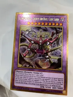 YUGIOH! CRIMSON NOVA TRINITY THE DARK CUBIC LORD GOLD RARE-1ST EDITION-MVP1-EN - Image 1