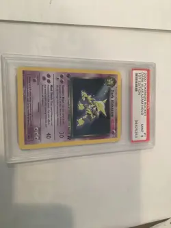 Pokemon 2000 Dark Alakazam 1/82 Team Rocket Holo PSA mint 9 - Image 1