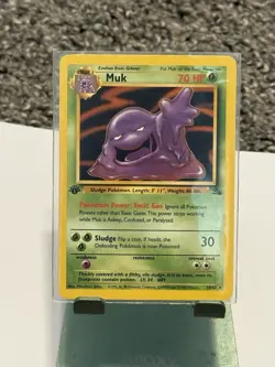 The Pokemon Company Pokemon TCG Fossil 1st Edition Muk 48/62 Common Reg 50HP - Image 1