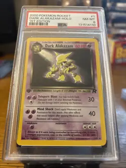 2000 POKEMON ROCKET 1ST EDITION #1 DARK ALAKAZAM-HOLO PSA 8 Swirl - Image 1