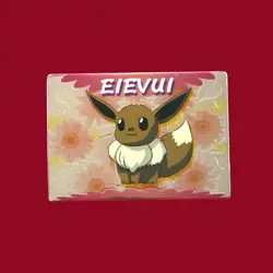 EEVEE (EIVUI)--JAPANESE MEIJI EMBOSSED PROMO FOIL POKEMON CARD - Image 1