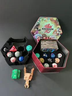 Bakugan Battle Brawlers - 19 Bakugan Battle Brawlers with cards and tin. - Image 1