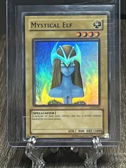 Mystical Elf – LOB-062 – Unlimited – Super Rare – Yu-Gi-Oh!(Damged) - Image 1