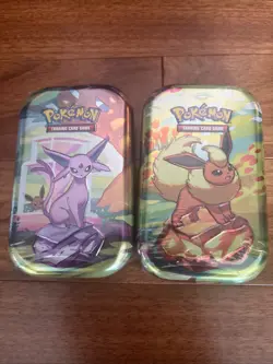 Pokemon TCG - Prismatic Evolutions Mini Tin Lot Of 2 Flareon And Espeon Sealed - Image 1