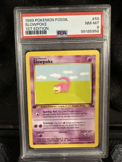 1999 POKEMON FOSSIL 1ST ED #55 SLOWPOKE PSA 8 - Image 1