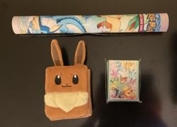 Pokemon Prismatic Evolutions UPC Accessories: Playmat, Eevee Deck Box, Sleeves - Image 1