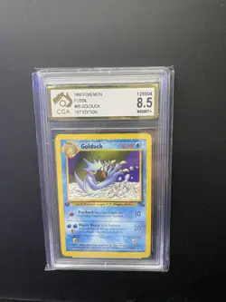 Golduck 35/62 WOTC Fossil Pokemon 1st Edition CGA 8.5 - Image 1