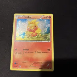 Torchic 3/12 McDonald's Holo Promo Pokemon Card 2014 HP OC Off Center - Image 1