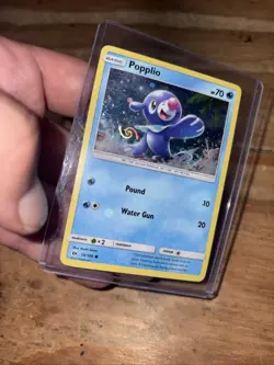 Popplio 39/149 Cosmos holo Pokemon Card (Sun & Moon Base Set) LP - Image 1