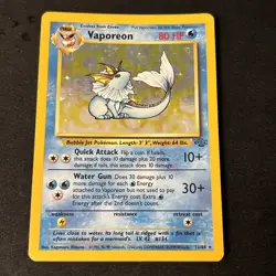 Vaporeon 12/64 Jungle Rare Holo WOTC Pokemon Card - Image 1