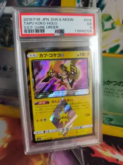 Pokemon Card Tapu Koko Holo S.E.P. DArk Order Prism Stamp Japanese PSA 5 - Image 1