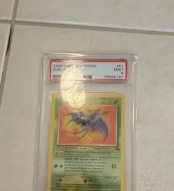 1999 Pokemon Fossil Zubat #57 PSA 9 Mint - Image 1