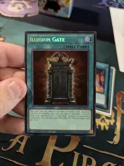 Yugioh Illusion Gate Spell Card Secret Rare 1st Edition Yu-Gi-Oh! TCG MZMU-EN023 - Image 1