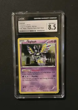2012 Pokemon Black And White Sigilyph- COSMOS Holo Dragons Exalted- Mint CGC 8.5 - Image 1