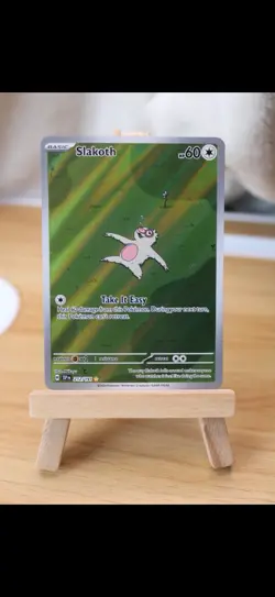 The Pokemon Company Slakoth Illustration Rare Holo 60 HP 212/191 Surging Sparks - Image 1