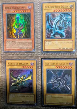 Vintage YUGIOH HOLO 4pack B.Ey.Wh.Dr, RedEy, CurOfDrag,DarkNec RAINBOW RARE NM - Image 1
