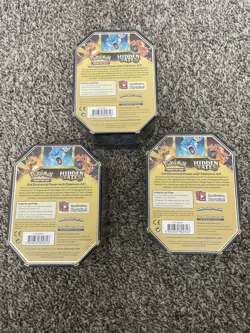 Pokemon - Hidden Fates - Lot of 3 Tins - Charizard, Raichu, Gyarados - Sealed - Image 2