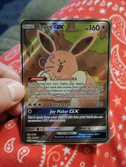 Highly Collectible evee GX SM233 Black Star Promo Holo Pokemon Card - Image 1