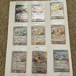 Pokemon Prismatic Evolutions Stamped SEALED PROMOS 9 Card Set & FREE Eevee VMAX - Image 1