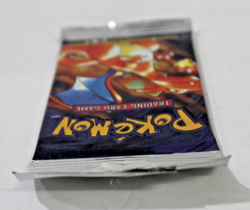 1999 Pokemon Base Set Unlimited Long Crimp Charizard Booster Pack LIGHT, SEALED - Image 3