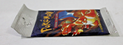1999 Pokemon Base Set Unlimited Long Crimp Charizard Booster Pack LIGHT, SEALED - Image 4