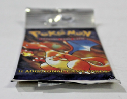 1999 Pokemon Base Set Unlimited Long Crimp Charizard Booster Pack LIGHT, SEALED - Image 5