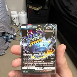 The Pokemon Company Guzzlord GX Holo 210 HP 63/111 Sm-Crimson Invasion - Image 1