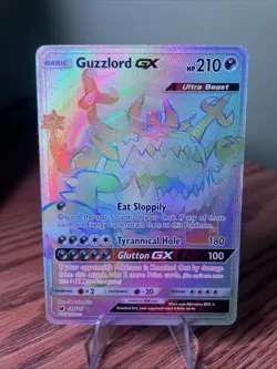 Guzzlord GX 116/111 Rainbow Secret Rare Crimson Invasion Pokemon Card - Image 1
