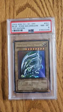 2002 Yu-Gi-Oh Kaiba 1st Edition Blue-Eyes White Dragon #SDK-001 PSA 8 - Image 1