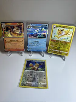 Eevee 130/185 Jolteon 047/185 Vaporeon 134/165 Flareon 136/165 NM Pokemon TCG - Image 1