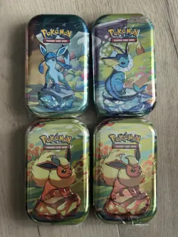 Pokemon TCG Prismatic Evolutions Mini Tins - Lot of 4 - NEW, SEALED! - Image 1