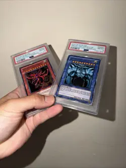 2013-2018 YU-GI-OH! LEGEND COLL GAMEBOARD ED #EN002 Slifer & Obelisk PSA 8 - Image 1