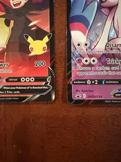 Pokemon Celebrations Lance’s Charizard V SWSH133 & Dark Sylveon V SWSH134 Cards - Image 5