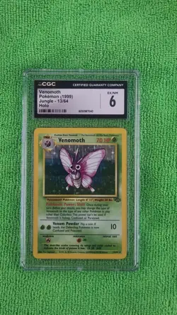 Venomoth. Pokemon (1999). Jungle - 13/64. Holo style. CGC graded 6. - Image 1