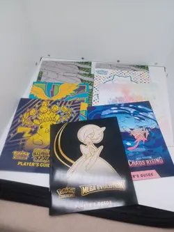 Lot Of (9) Pokemon Players Guide Various Sets ETB Booklets 151, Surging Ascended - Image 1