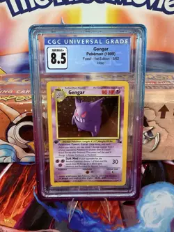 POKEMON 1999 1ST EDITION GENGAR HOLO FOSSIL CGC 8.5 - Image 1