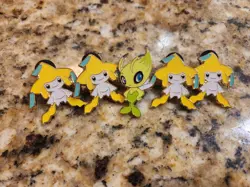 Jirachi and Celebi Official Pokemon TCG Clothing Pins - Image 1