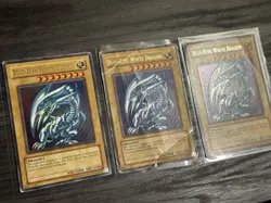 Yu-Gi-Oh! 3X Vintage Blue-Eyes White Dragon SDK-001 Unlimited Damaged - Image 1