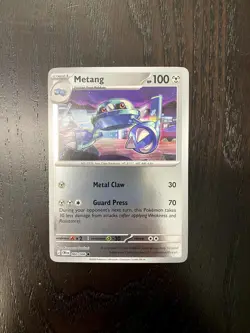 Metang 060/086 Common ME04: Chaos Rising Pokemon Reverse Holo Near Mint - Image 1