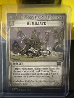 MTG OTJ Breaking News U Humiliate #0047 - Image 1