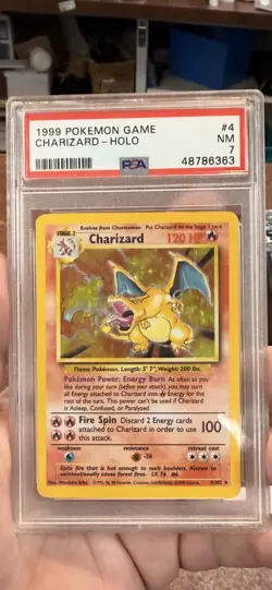1999 Pokemon Base Set Unlimited #4 Charizard-Holo PSA 7 Certified - Image 1