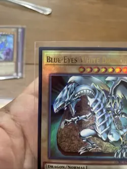 Blue-Eyes White Dragon LCKC-EN001 Unlimited Ultra Rare NearMint +Bonus( vers. 3) - Image 2
