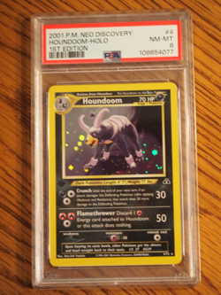 Pokemon 1st Edition Neo Discovery Houndoom rare foil card, PSA 8 - Image 1
