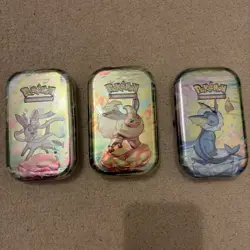 ✨ Pokemon Prismatic Evolutions Mini Tins x3 Brand New Sealed - Image 1