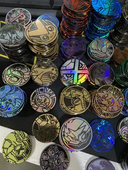 Pokemon TCG Official Lot of 100 Coins DUPLICATES Jumbo Regular - Image 2