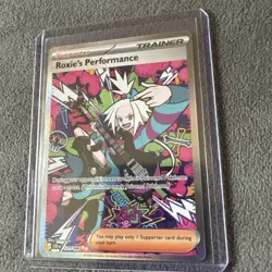 Roxie's Performance 121/086 Me04: Chaos Rising Holo Pokemon TCG Card Rare Art - Image 2