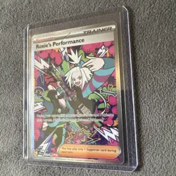 Roxie's Performance 121/086 Me04: Chaos Rising Holo Pokemon TCG Card Rare Art - Image 3