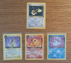 Pokemon WOTC Team Rocket Eeveelutions, Dark Flareon, Jolteon, Vaporeon, & Eevee - Image 1